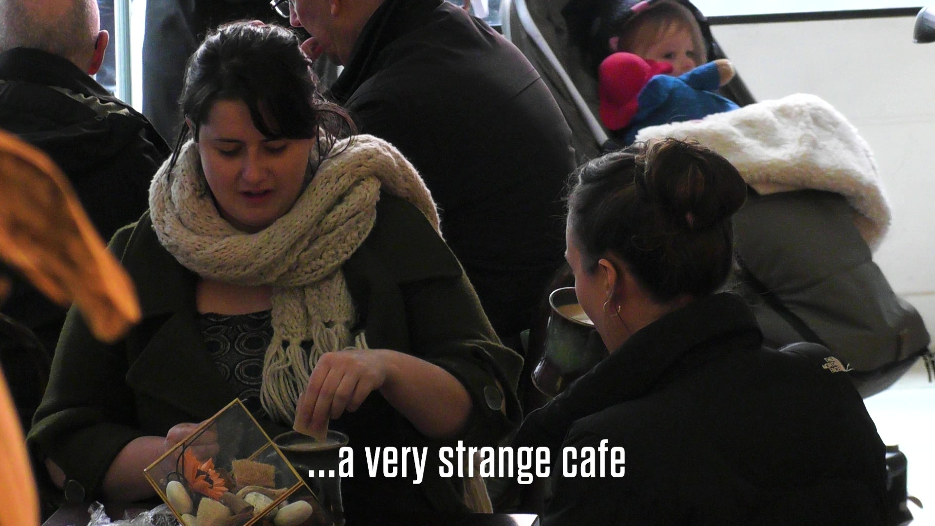 MSUnderstood café advertising Multiple Sclerosis with woman saying this is a very strange cafe